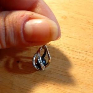 Black pearl in silver cage pendant